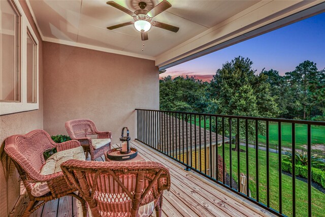 balcony at dusk with ceiling fan