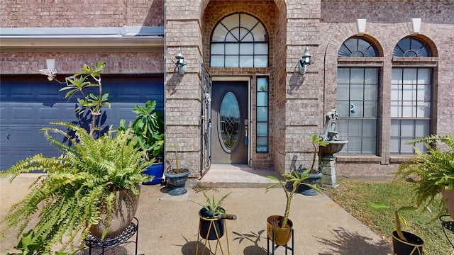 property entrance with a garage