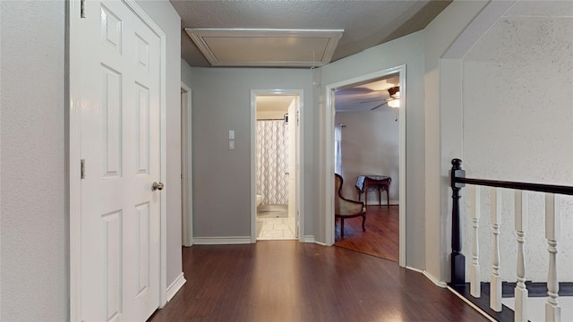 hall featuring dark wood-type flooring