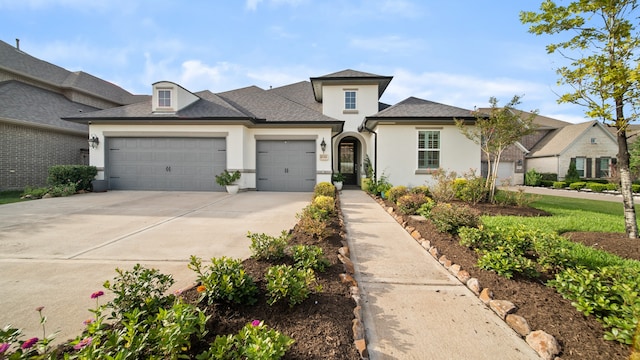 view of front of property with a garage