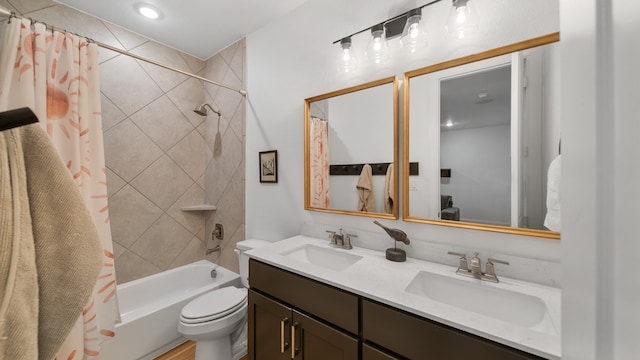 full bathroom featuring double vanity, toilet, and shower / tub combo with curtain