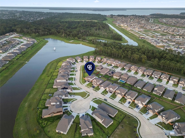 bird's eye view with a water view and a residential view