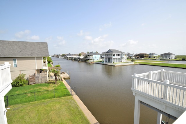 property view of water with a dock