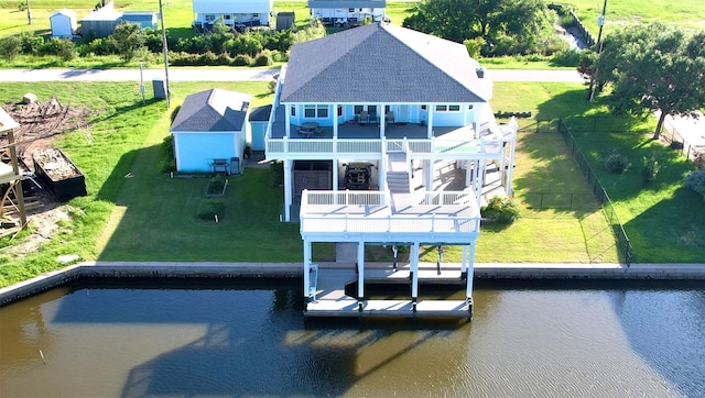 back of house featuring a water view