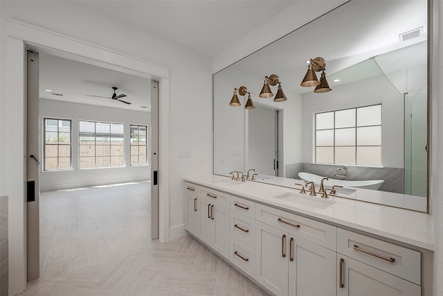 bathroom featuring vanity and ceiling fan