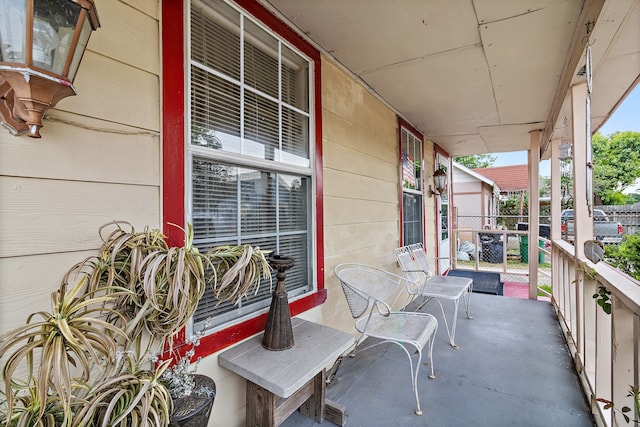 balcony featuring a porch