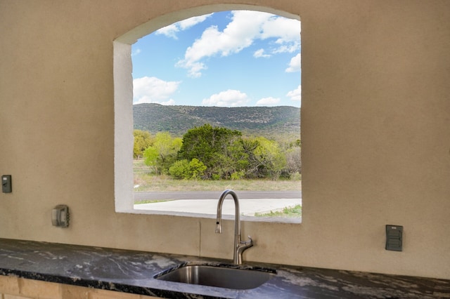 interior details with a mountain view and sink