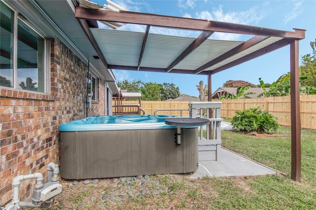 exterior space featuring a hot tub