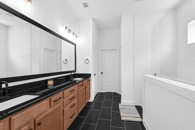 bathroom with vanity and tile patterned floors