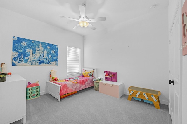 bedroom with ceiling fan and carpet flooring