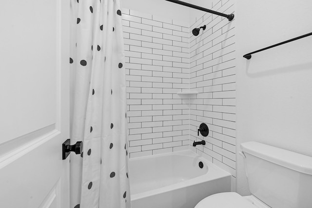 bathroom with shower / bathtub combination with curtain and toilet