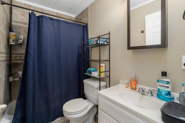 bathroom featuring a shower with curtain, vanity, toilet, and crown molding