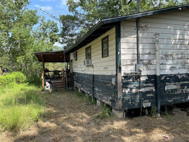 view of property exterior with cooling unit