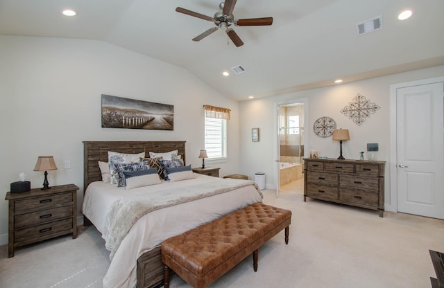 carpeted bedroom featuring connected bathroom, ceiling fan, and lofted ceiling