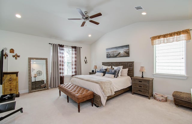 bedroom with ceiling fan, carpet, and vaulted ceiling