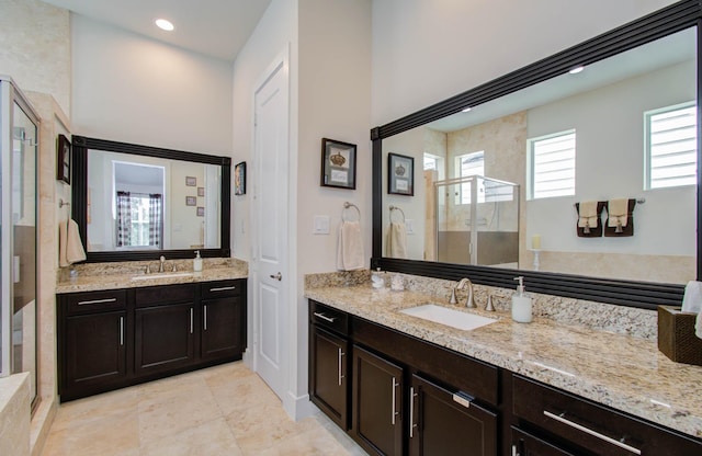 bathroom featuring vanity and walk in shower