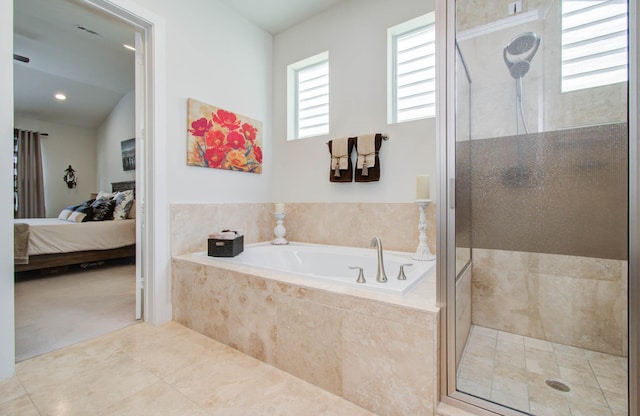 bathroom featuring tile patterned flooring, plus walk in shower, and lofted ceiling