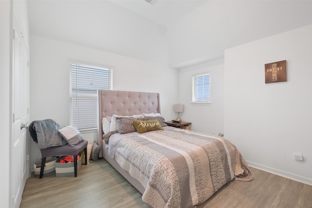 bedroom with light hardwood / wood-style flooring