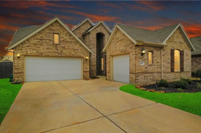 view of front of home with a garage