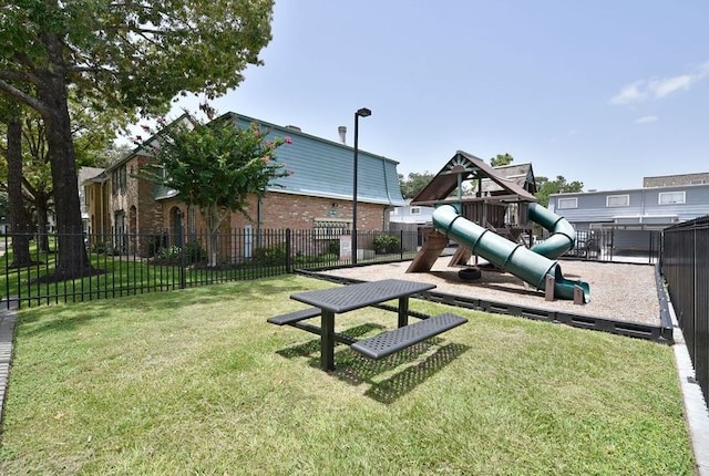 view of play area featuring a lawn