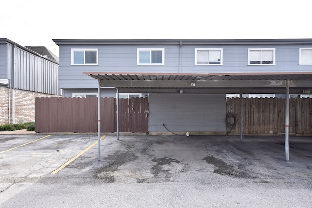 exterior space with a carport