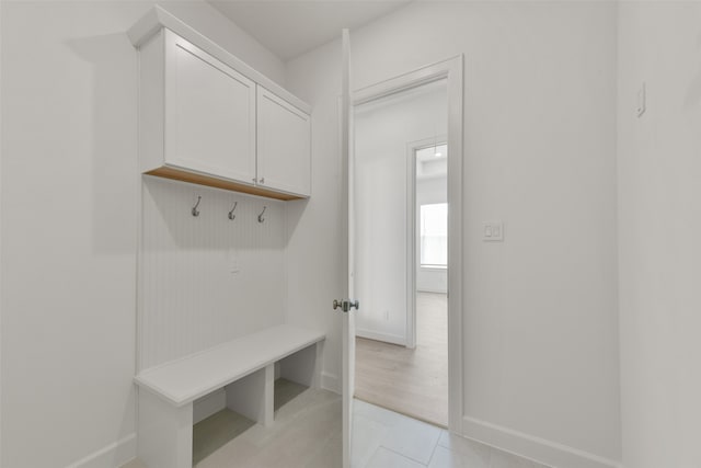 mudroom featuring light tile patterned flooring