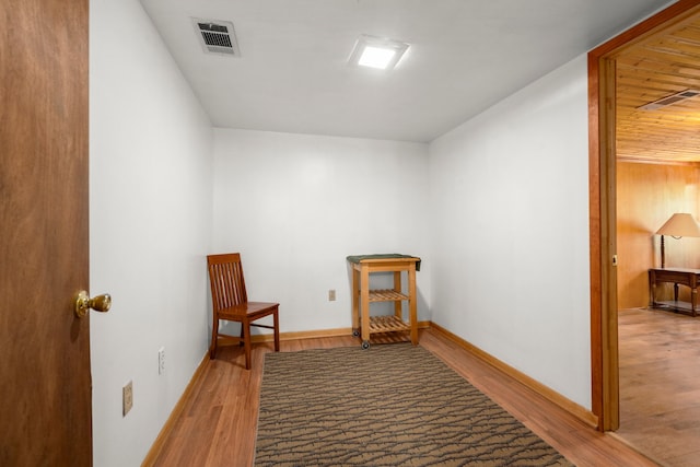 sitting room featuring light hardwood / wood-style floors