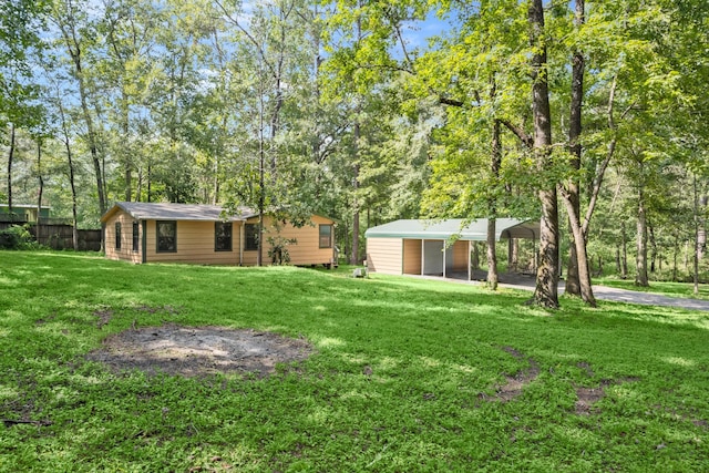 view of yard with a carport