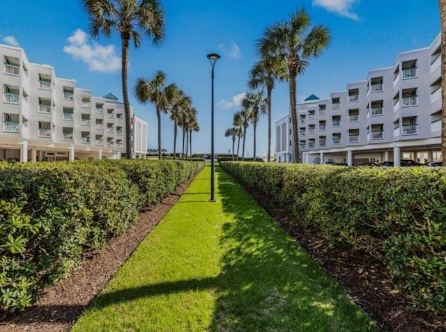 view of community with a lawn