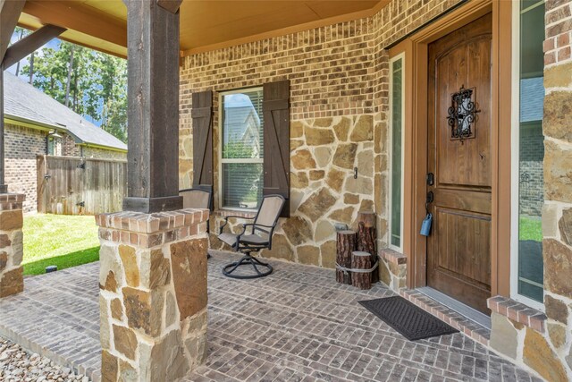 property entrance with a porch