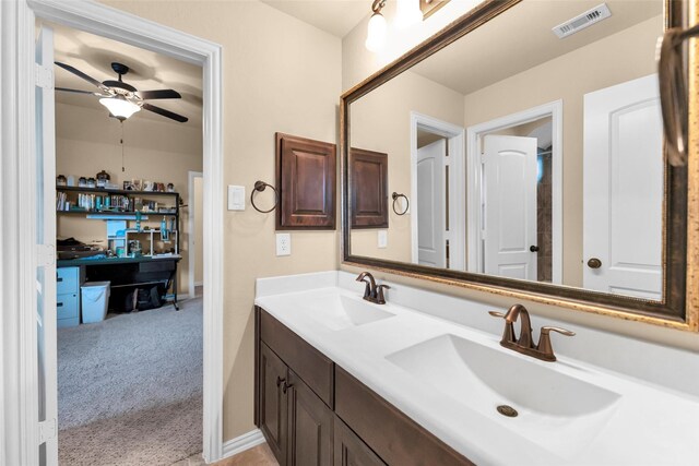 bathroom featuring vanity and ceiling fan