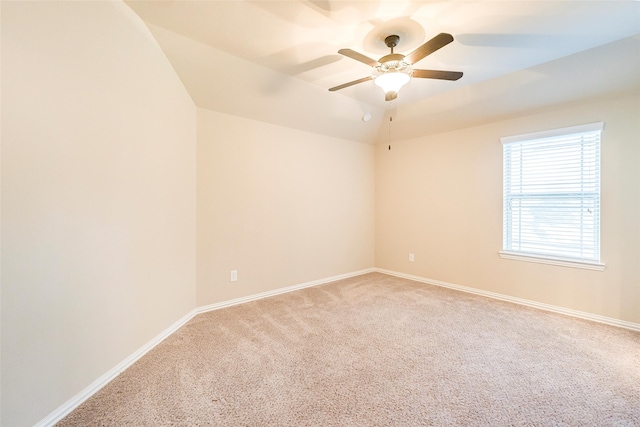 203 Gaillardia Ct, Pinehurst, TX 77362 - spare room with carpet flooring, ceiling fan, baseboards, and lofted ceiling