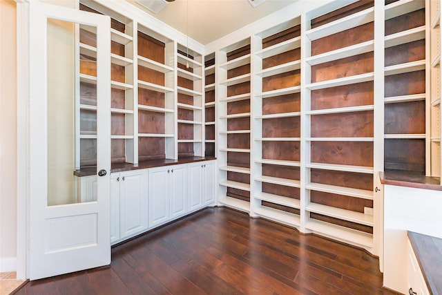 203 Gaillardia Ct, Pinehurst, TX 77362 - empty room with dark wood-style flooring