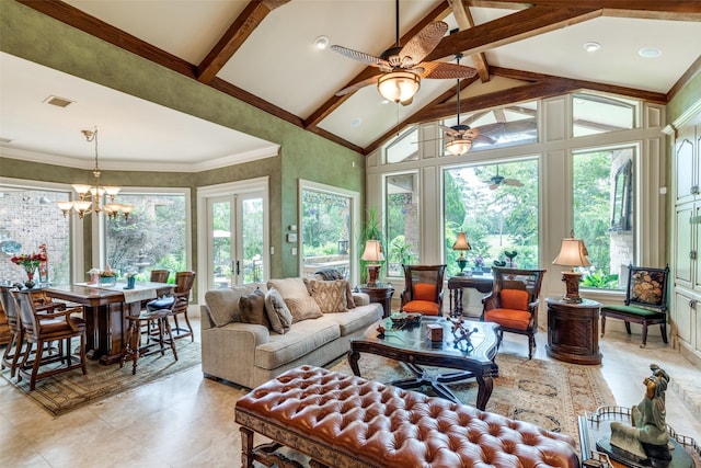 sunroom / solarium featuring lofted ceiling with beams, ceiling fan with notable chandelier, and french doors