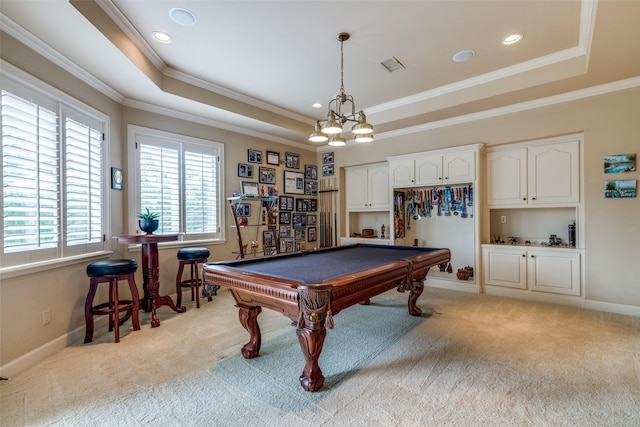 game room featuring a raised ceiling, light carpet, ornamental molding, and pool table