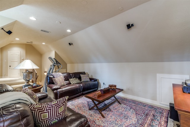 living room with vaulted ceiling