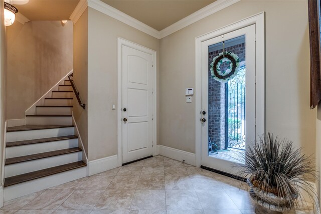 foyer entrance with ornamental molding