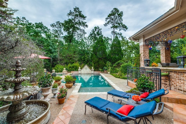 view of pool with a patio