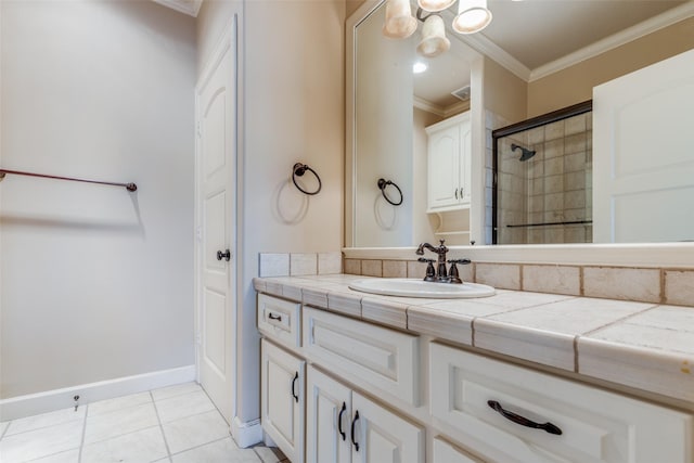 bathroom featuring tile patterned flooring, vanity, an enclosed shower, and crown molding