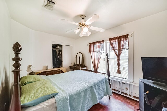 bedroom with a closet and ceiling fan