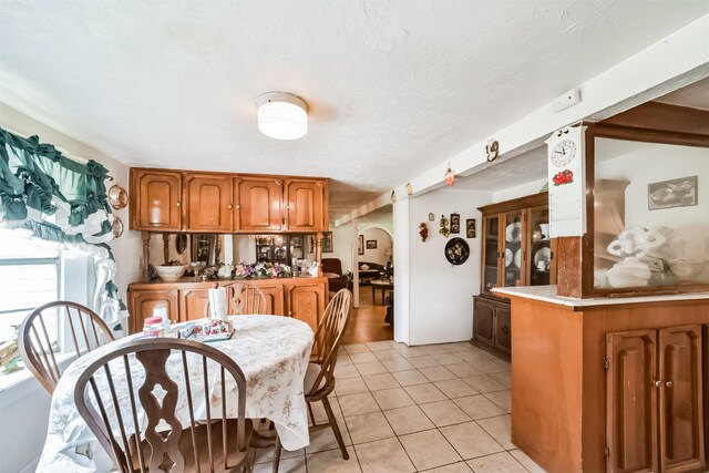 dining room with light tile patterned floors