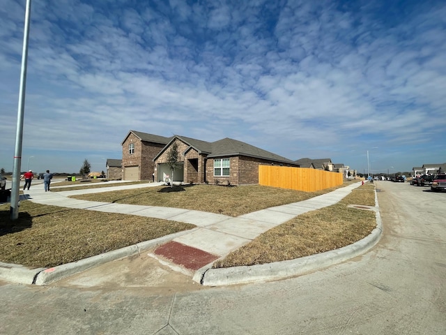 view of front of home featuring a front lawn