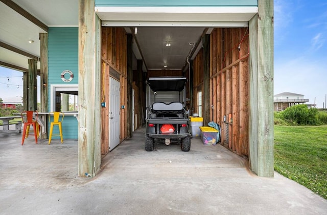 exterior space with a yard and wooden walls