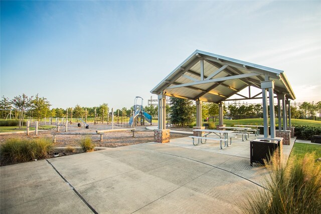 surrounding community featuring a playground and a gazebo