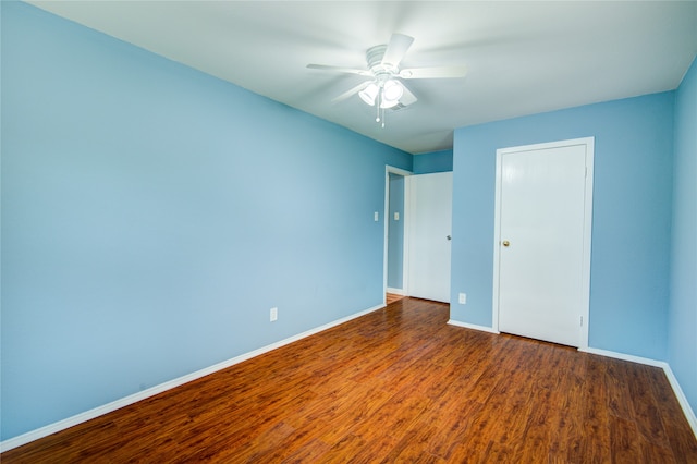 unfurnished bedroom with hardwood / wood-style floors and ceiling fan