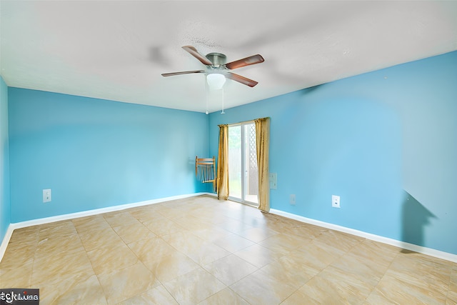 unfurnished room featuring light tile patterned floors and ceiling fan