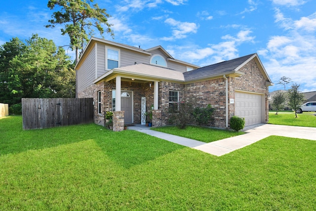 view of front of property featuring a garage and a front yard