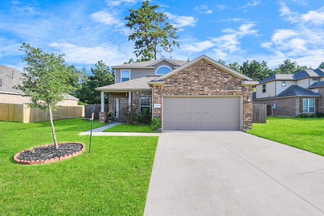 view of front of property with a garage and a front lawn