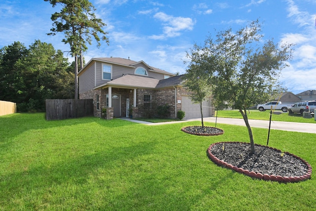 view of front of property featuring a garage and a front yard