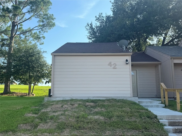 exterior space featuring a lawn